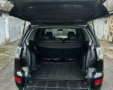 Чорний Міцубісі Аутлендер ХЛ, об'ємом двигуна 2.4 л та пробігом 283 тис. км за 8900 $, фото 26 на Automoto.ua