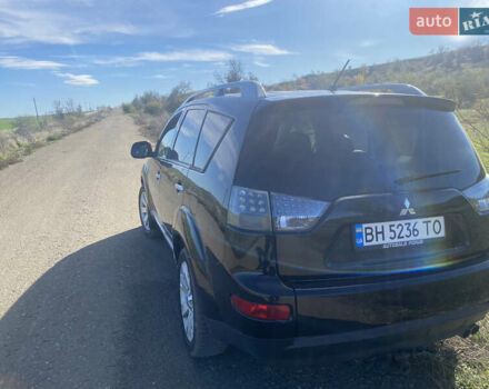 Черный Мицубиси Аутлендер ХЛ, объемом двигателя 1.97 л и пробегом 207 тыс. км за 8200 $, фото 3 на Automoto.ua