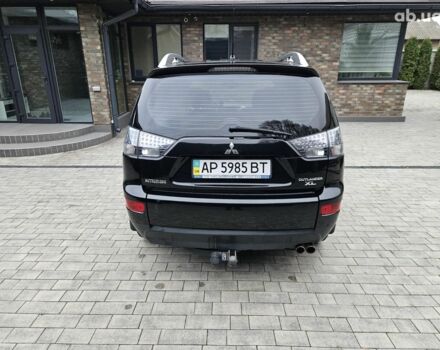 Чорний Міцубісі Аутлендер ХЛ, об'ємом двигуна 3 л та пробігом 238 тис. км за 10800 $, фото 5 на Automoto.ua