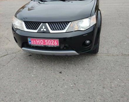 Черный Мицубиси Аутлендер ХЛ, объемом двигателя 2 л и пробегом 218 тыс. км за 10500 $, фото 12 на Automoto.ua