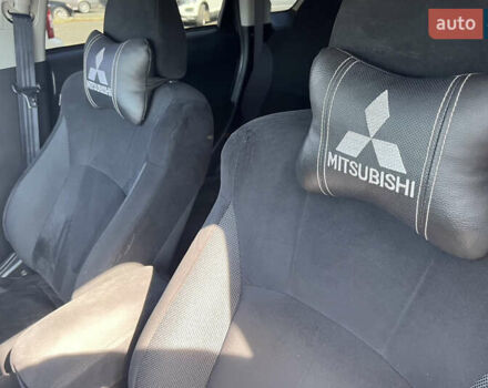 Черный Мицубиси Аутлендер ХЛ, объемом двигателя 3 л и пробегом 169 тыс. км за 9300 $, фото 9 на Automoto.ua