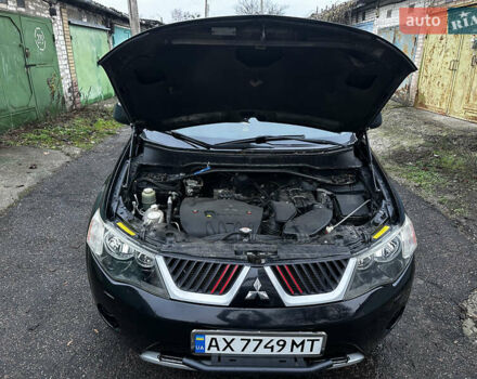 Чорний Міцубісі Аутлендер ХЛ, об'ємом двигуна 2.4 л та пробігом 283 тис. км за 8900 $, фото 29 на Automoto.ua