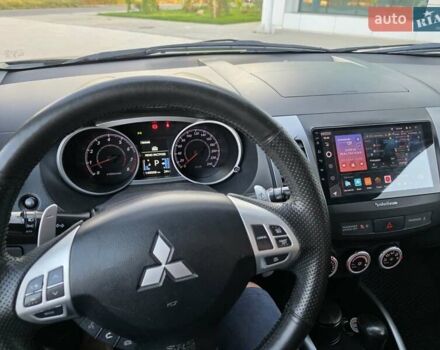 Черный Мицубиси Аутлендер ХЛ, объемом двигателя 3 л и пробегом 150 тыс. км за 9500 $, фото 1 на Automoto.ua