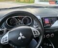 Черный Мицубиси Аутлендер ХЛ, объемом двигателя 3 л и пробегом 150 тыс. км за 9500 $, фото 1 на Automoto.ua