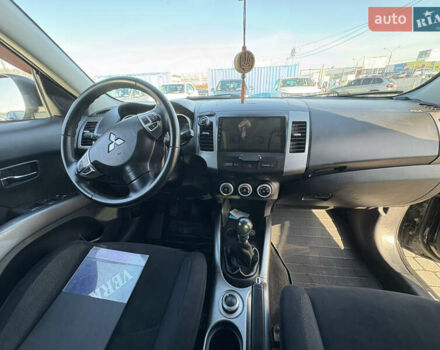 Черный Мицубиси Аутлендер ХЛ, объемом двигателя 2 л и пробегом 264 тыс. км за 7950 $, фото 11 на Automoto.ua