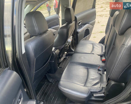 Черный Мицубиси Аутлендер ХЛ, объемом двигателя 1.97 л и пробегом 207 тыс. км за 8200 $, фото 16 на Automoto.ua