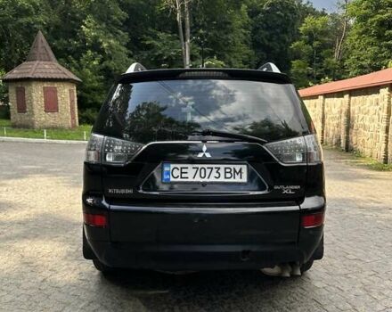 Чорний Міцубісі Аутлендер ХЛ, об'ємом двигуна 3 л та пробігом 264 тис. км за 9500 $, фото 1 на Automoto.ua