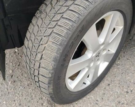 Черный Мицубиси Аутлендер ХЛ, объемом двигателя 2 л и пробегом 218 тыс. км за 10500 $, фото 13 на Automoto.ua