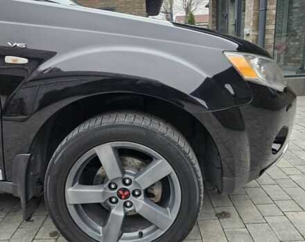 Чорний Міцубісі Аутлендер ХЛ, об'ємом двигуна 3 л та пробігом 238 тис. км за 10800 $, фото 12 на Automoto.ua