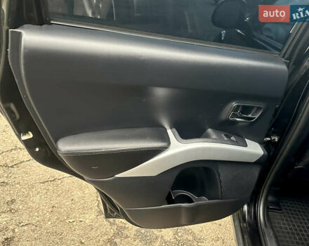 Черный Мицубиси Аутлендер ХЛ, объемом двигателя 2.4 л и пробегом 230 тыс. км за 8500 $, фото 21 на Automoto.ua