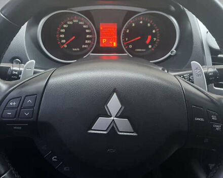 Черный Мицубиси Аутлендер ХЛ, объемом двигателя 3 л и пробегом 169 тыс. км за 9300 $, фото 2 на Automoto.ua