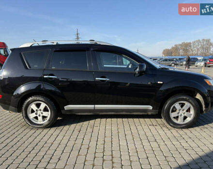 Черный Мицубиси Аутлендер ХЛ, объемом двигателя 2 л и пробегом 264 тыс. км за 7950 $, фото 2 на Automoto.ua