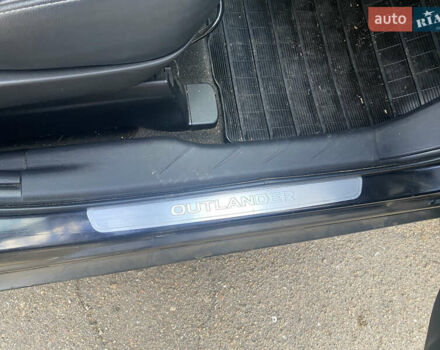 Черный Мицубиси Аутлендер ХЛ, объемом двигателя 1.97 л и пробегом 207 тыс. км за 8200 $, фото 18 на Automoto.ua