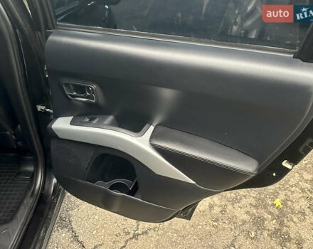 Черный Мицубиси Аутлендер ХЛ, объемом двигателя 2.4 л и пробегом 230 тыс. км за 8500 $, фото 19 на Automoto.ua