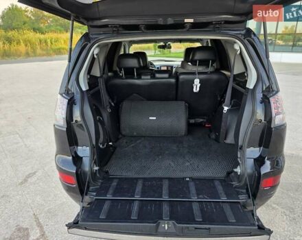 Черный Мицубиси Аутлендер ХЛ, объемом двигателя 3 л и пробегом 150 тыс. км за 9500 $, фото 7 на Automoto.ua