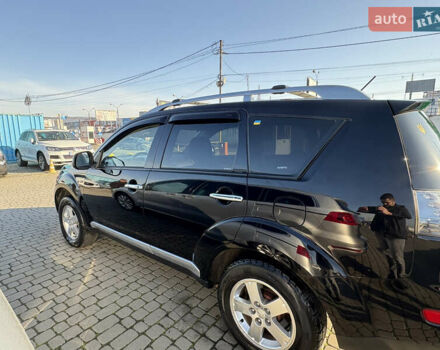 Черный Мицубиси Аутлендер ХЛ, объемом двигателя 2 л и пробегом 264 тыс. км за 7950 $, фото 6 на Automoto.ua