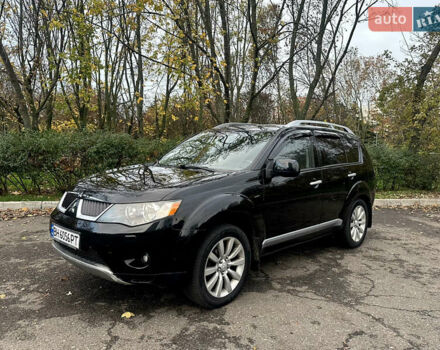 Черный Мицубиси Аутлендер ХЛ, объемом двигателя 2.4 л и пробегом 230 тыс. км за 8500 $, фото 3 на Automoto.ua