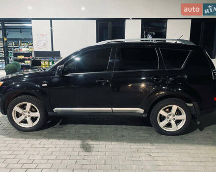 Черный Мицубиси Аутлендер ХЛ, объемом двигателя 3 л и пробегом 253 тыс. км за 9800 $, фото 7 на Automoto.ua