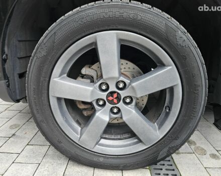 Чорний Міцубісі Аутлендер ХЛ, об'ємом двигуна 3 л та пробігом 238 тис. км за 10800 $, фото 13 на Automoto.ua