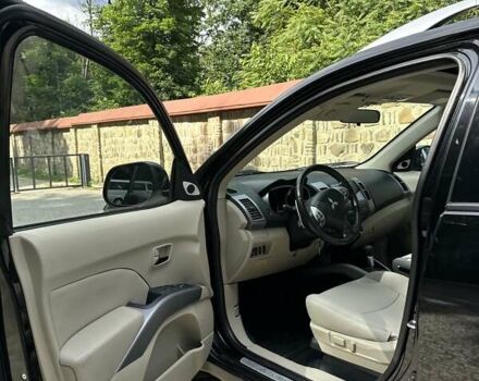 Чорний Міцубісі Аутлендер ХЛ, об'ємом двигуна 3 л та пробігом 264 тис. км за 9500 $, фото 14 на Automoto.ua