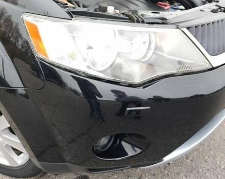 Черный Мицубиси Аутлендер ХЛ, объемом двигателя 2 л и пробегом 218 тыс. км за 10500 $, фото 1 на Automoto.ua