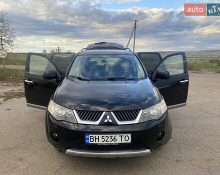 Черный Мицубиси Аутлендер ХЛ, объемом двигателя 1.97 л и пробегом 207 тыс. км за 8200 $, фото 1 на Automoto.ua