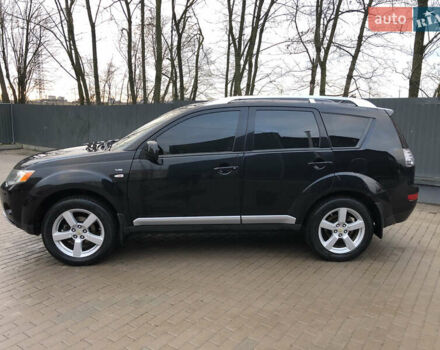 Черный Мицубиси Аутлендер ХЛ, объемом двигателя 3 л и пробегом 207 тыс. км за 9300 $, фото 2 на Automoto.ua