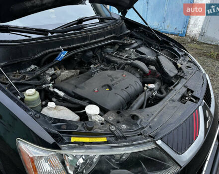 Черный Мицубиси Аутлендер ХЛ, объемом двигателя 2.4 л и пробегом 283 тыс. км за 8900 $, фото 33 на Automoto.ua