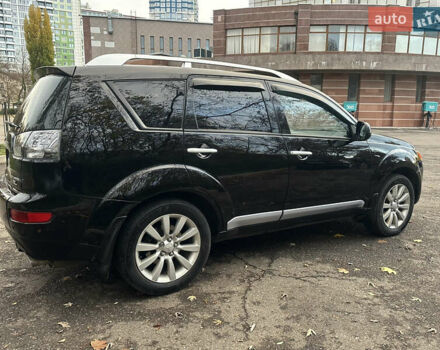 Черный Мицубиси Аутлендер ХЛ, объемом двигателя 2.4 л и пробегом 230 тыс. км за 8500 $, фото 7 на Automoto.ua