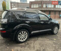 Черный Мицубиси Аутлендер ХЛ, объемом двигателя 2.4 л и пробегом 230 тыс. км за 8500 $, фото 7 на Automoto.ua