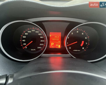 Черный Мицубиси Аутлендер ХЛ, объемом двигателя 3 л и пробегом 169 тыс. км за 9300 $, фото 1 на Automoto.ua