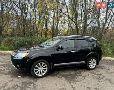Черный Мицубиси Аутлендер ХЛ, объемом двигателя 2.4 л и пробегом 230 тыс. км за 8500 $, фото 4 на Automoto.ua