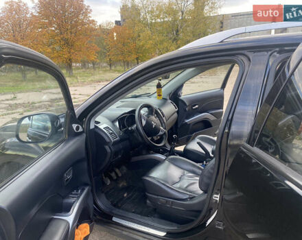 Черный Мицубиси Аутлендер ХЛ, объемом двигателя 1.97 л и пробегом 207 тыс. км за 8200 $, фото 11 на Automoto.ua