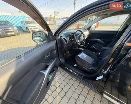 Черный Мицубиси Аутлендер ХЛ, объемом двигателя 2 л и пробегом 264 тыс. км за 7950 $, фото 13 на Automoto.ua