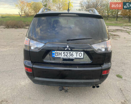 Черный Мицубиси Аутлендер ХЛ, объемом двигателя 1.97 л и пробегом 207 тыс. км за 8200 $, фото 2 на Automoto.ua