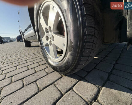 Черный Мицубиси Аутлендер ХЛ, объемом двигателя 2 л и пробегом 264 тыс. км за 7950 $, фото 19 на Automoto.ua