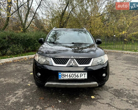 Черный Мицубиси Аутлендер ХЛ, объемом двигателя 2.4 л и пробегом 230 тыс. км за 8500 $, фото 2 на Automoto.ua