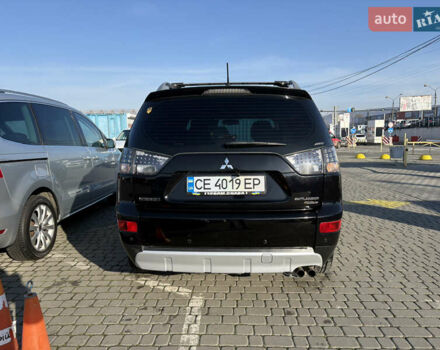 Черный Мицубиси Аутлендер ХЛ, объемом двигателя 2 л и пробегом 264 тыс. км за 7950 $, фото 4 на Automoto.ua