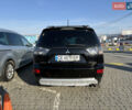 Черный Мицубиси Аутлендер ХЛ, объемом двигателя 2 л и пробегом 264 тыс. км за 7950 $, фото 4 на Automoto.ua