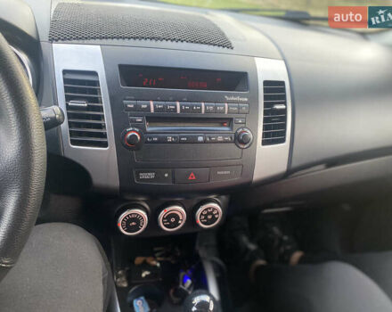 Черный Мицубиси Аутлендер ХЛ, объемом двигателя 1.97 л и пробегом 207 тыс. км за 8200 $, фото 23 на Automoto.ua