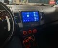 Черный Мицубиси Аутлендер ХЛ, объемом двигателя 2.36 л и пробегом 259 тыс. км за 9000 $, фото 4 на Automoto.ua