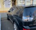 Чорний Міцубісі Аутлендер ХЛ, об'ємом двигуна 3 л та пробігом 182 тис. км за 11700 $, фото 3 на Automoto.ua