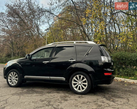 Черный Мицубиси Аутлендер ХЛ, объемом двигателя 2.4 л и пробегом 230 тыс. км за 8500 $, фото 5 на Automoto.ua