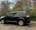 Черный Мицубиси Аутлендер ХЛ, объемом двигателя 2.4 л и пробегом 230 тыс. км за 8500 $, фото 5 на Automoto.ua