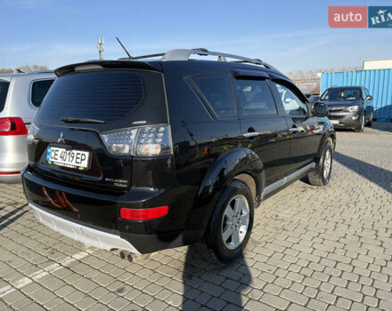 Черный Мицубиси Аутлендер ХЛ, объемом двигателя 2 л и пробегом 264 тыс. км за 7950 $, фото 3 на Automoto.ua