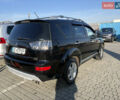 Черный Мицубиси Аутлендер ХЛ, объемом двигателя 2 л и пробегом 264 тыс. км за 7950 $, фото 3 на Automoto.ua