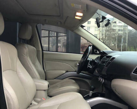 Черный Мицубиси Аутлендер ХЛ, объемом двигателя 3 л и пробегом 207 тыс. км за 9300 $, фото 1 на Automoto.ua