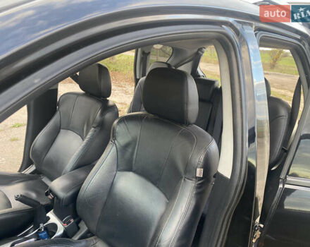 Черный Мицубиси Аутлендер ХЛ, объемом двигателя 1.97 л и пробегом 207 тыс. км за 8200 $, фото 15 на Automoto.ua