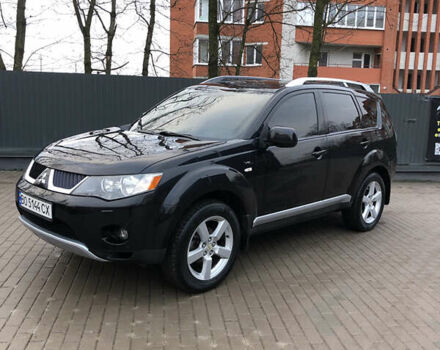 Черный Мицубиси Аутлендер ХЛ, объемом двигателя 3 л и пробегом 207 тыс. км за 9300 $, фото 4 на Automoto.ua