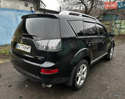Черный Мицубиси Аутлендер ХЛ, объемом двигателя 2.4 л и пробегом 283 тыс. км за 8900 $, фото 7 на Automoto.ua